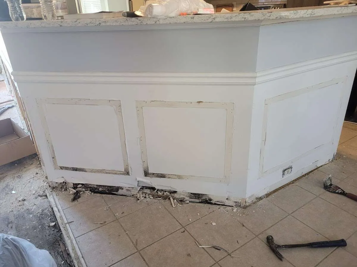 Water damage and mold on kitchen during Storm Damage Restoration in Slinger